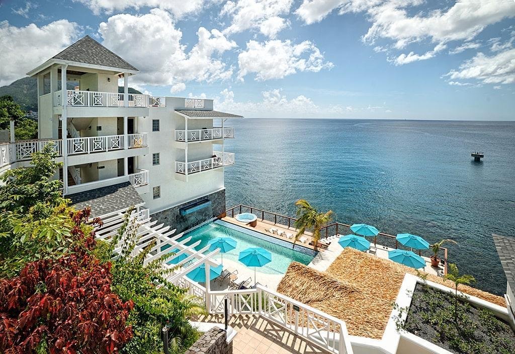 Aerial view of the Fort Young Hotel and pool overlooking the sea